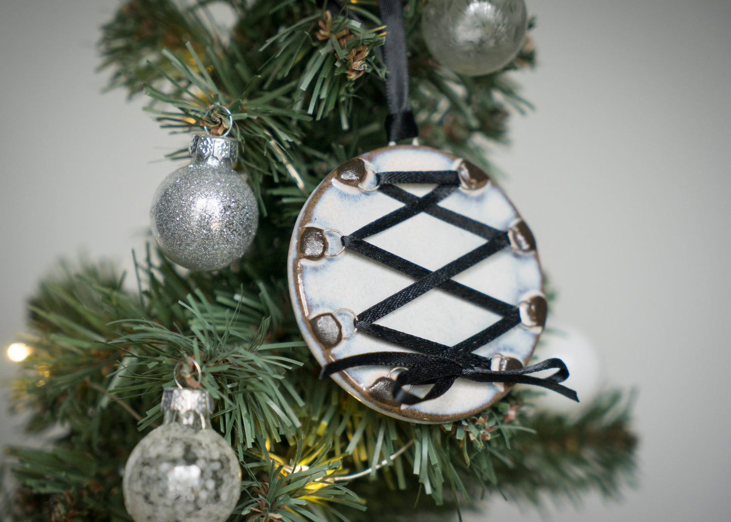 Glazed Black Clay Corset Ornaments